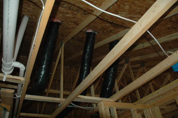 Bath fan ducts through ceiling