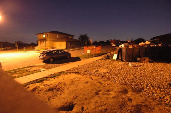 Prius in front of house at night