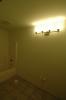 Hallway bathroom with lights