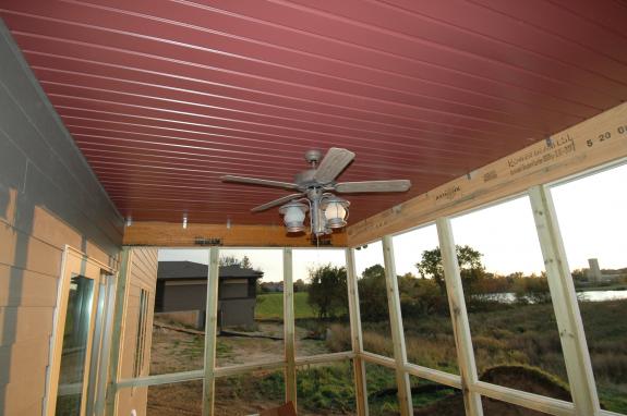 Ceiling fan and light kit on porch