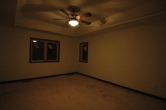 Master bedroom with ceiling fan